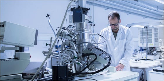 technician calibrating lab equipment